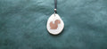 Collier Écureuil — Ivoire Végétal & Noyer